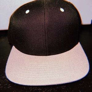 Black, grey, and green SnapBack from Lids